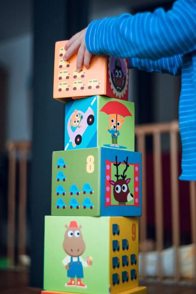 Child stacking toy boxes